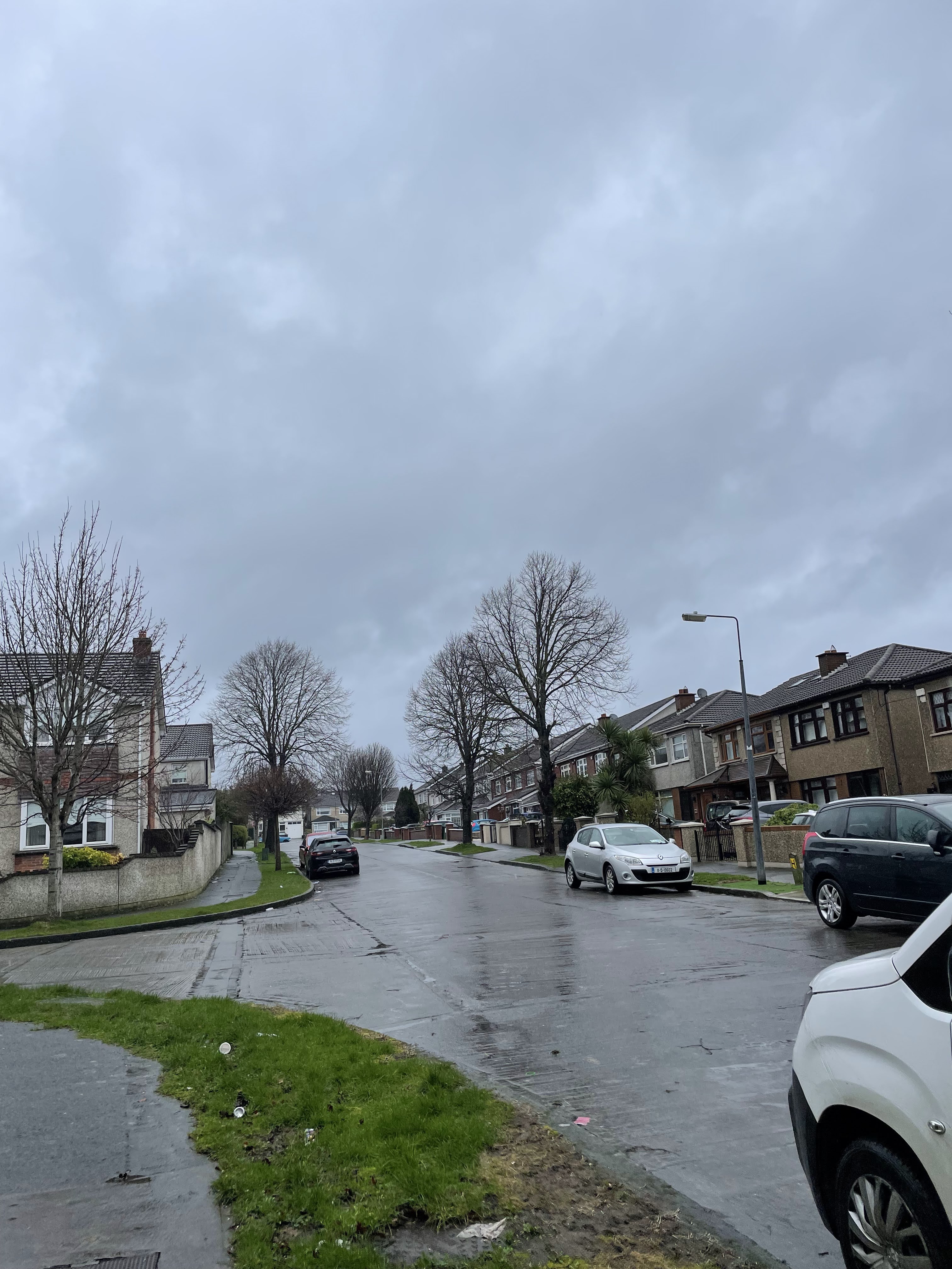 a rainy street in a neighborhood in the outskirts of Dublin, Ireland