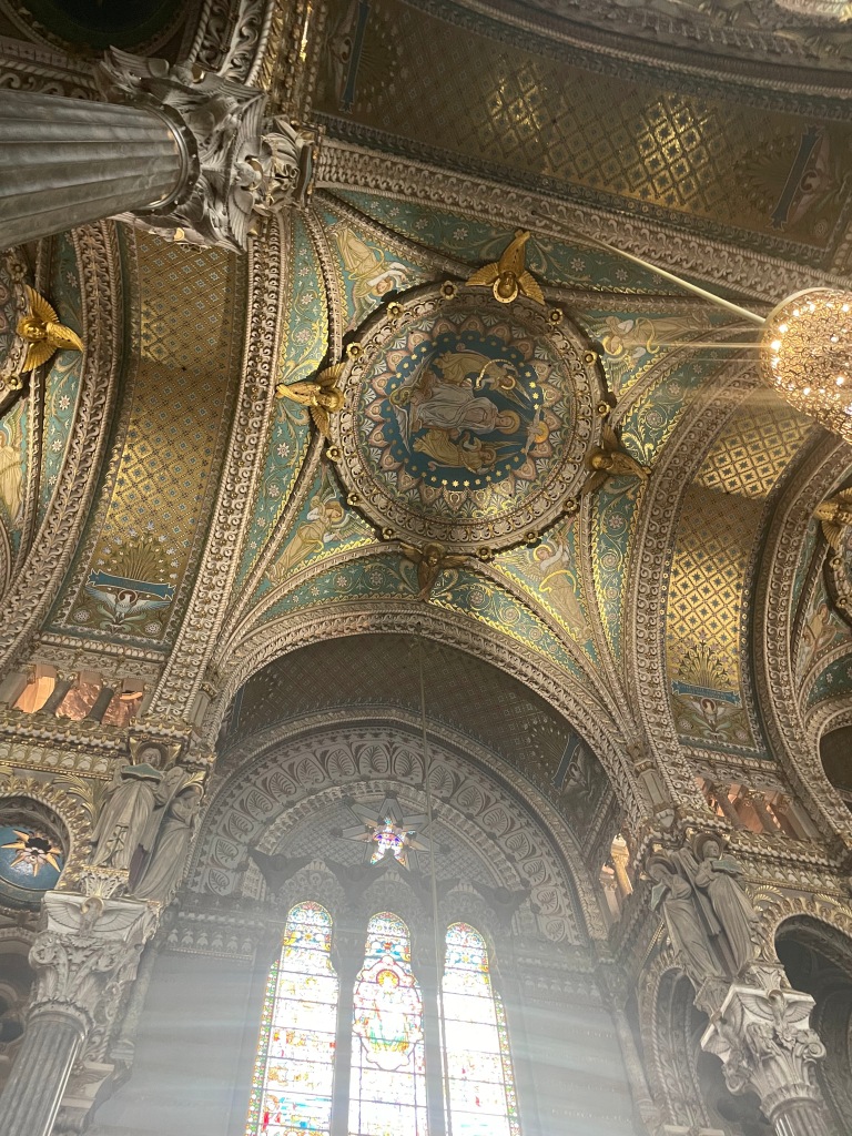 Tiny mosaics covering the walls and ceilings of the Basilica Notre Dame de Fourvière