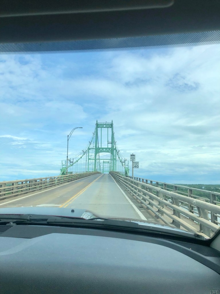 A truck driving over Collins Landing, which is a very steep bridge that leads to the Thousand Islands in Upstate New York
