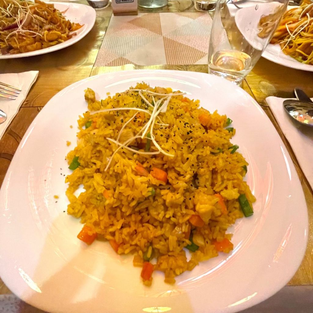 A plate of fried rice with chicken at a Vietnamese restaurant on the island of Malta