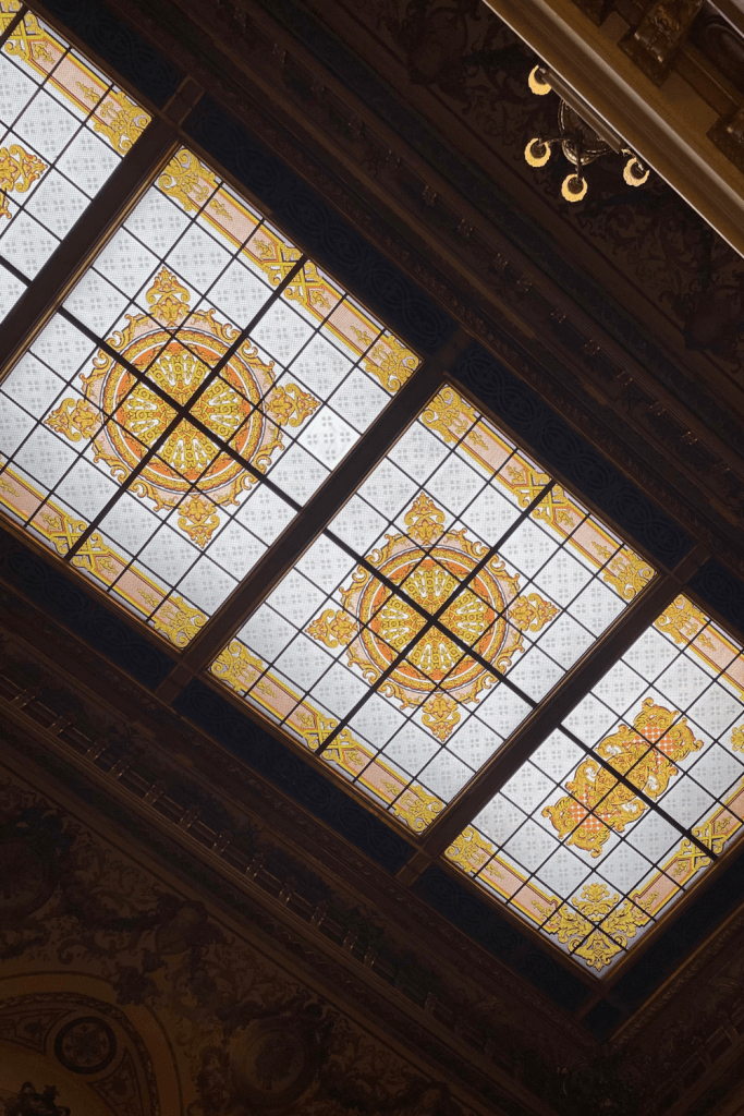 The stained glass window ceiling inside the Monte Carlo Casino in Monaco
