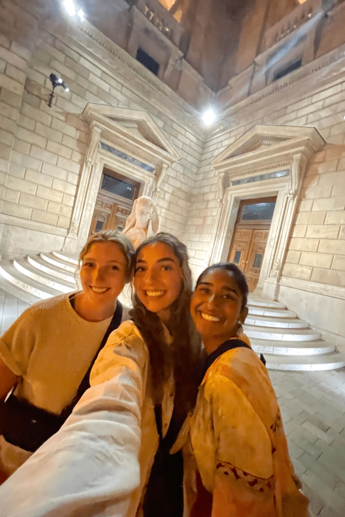 Three best friends smiling for a selfie while backpacking in Budapest, Hungary