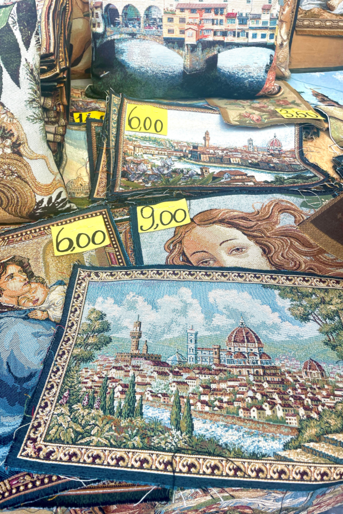 Stitched pillow cases with a scene of the Duomo at a market in Florence, Italy