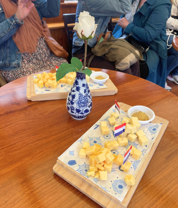 A plate of Gouda cheese samples while on a canal boat tour through Amsterdam in the Netherlands.