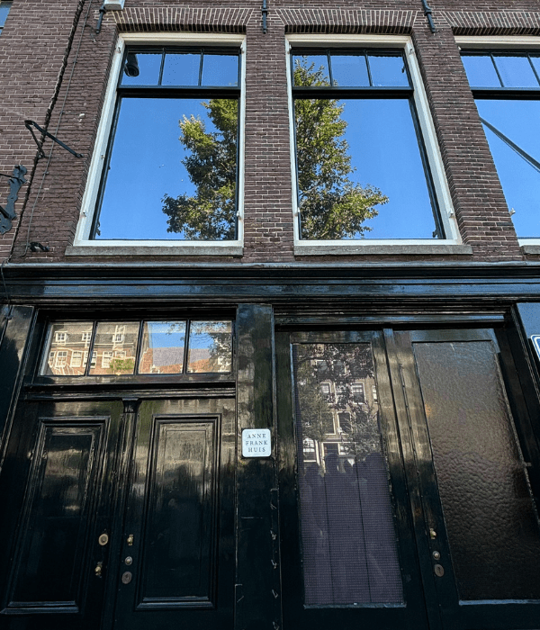 The front door of the building where Anne Frank and her family lived in Amsterdam during World War II, now referred to as the Anne Frank House.